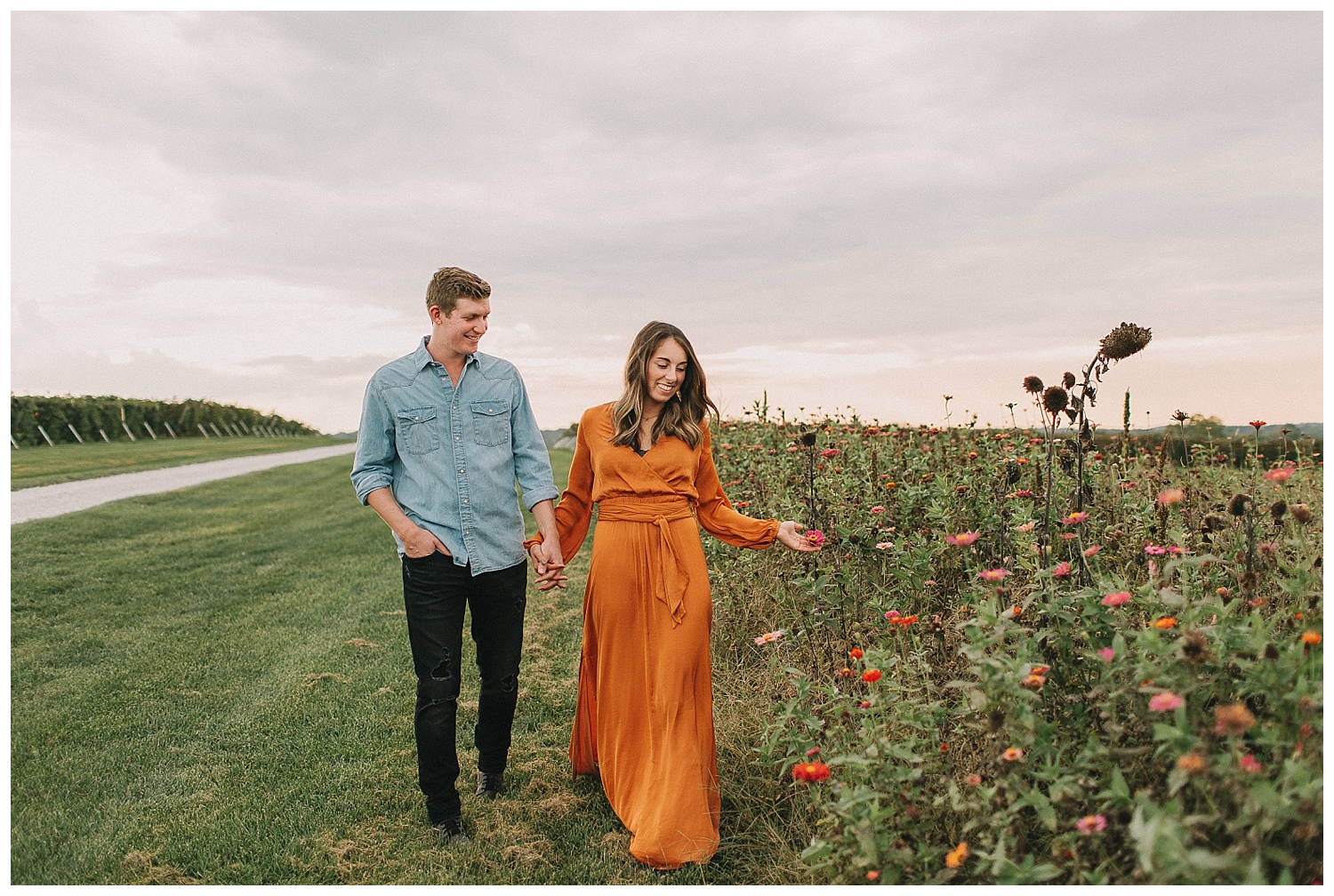 engagement pictures in a flower field