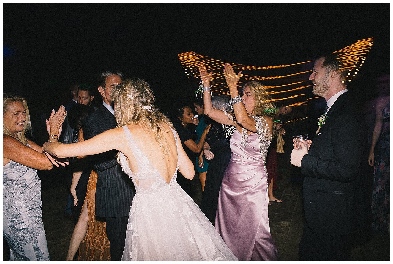 guests dancing at wedding reception at Old Indian Creek Farm in Olivet, Michigan