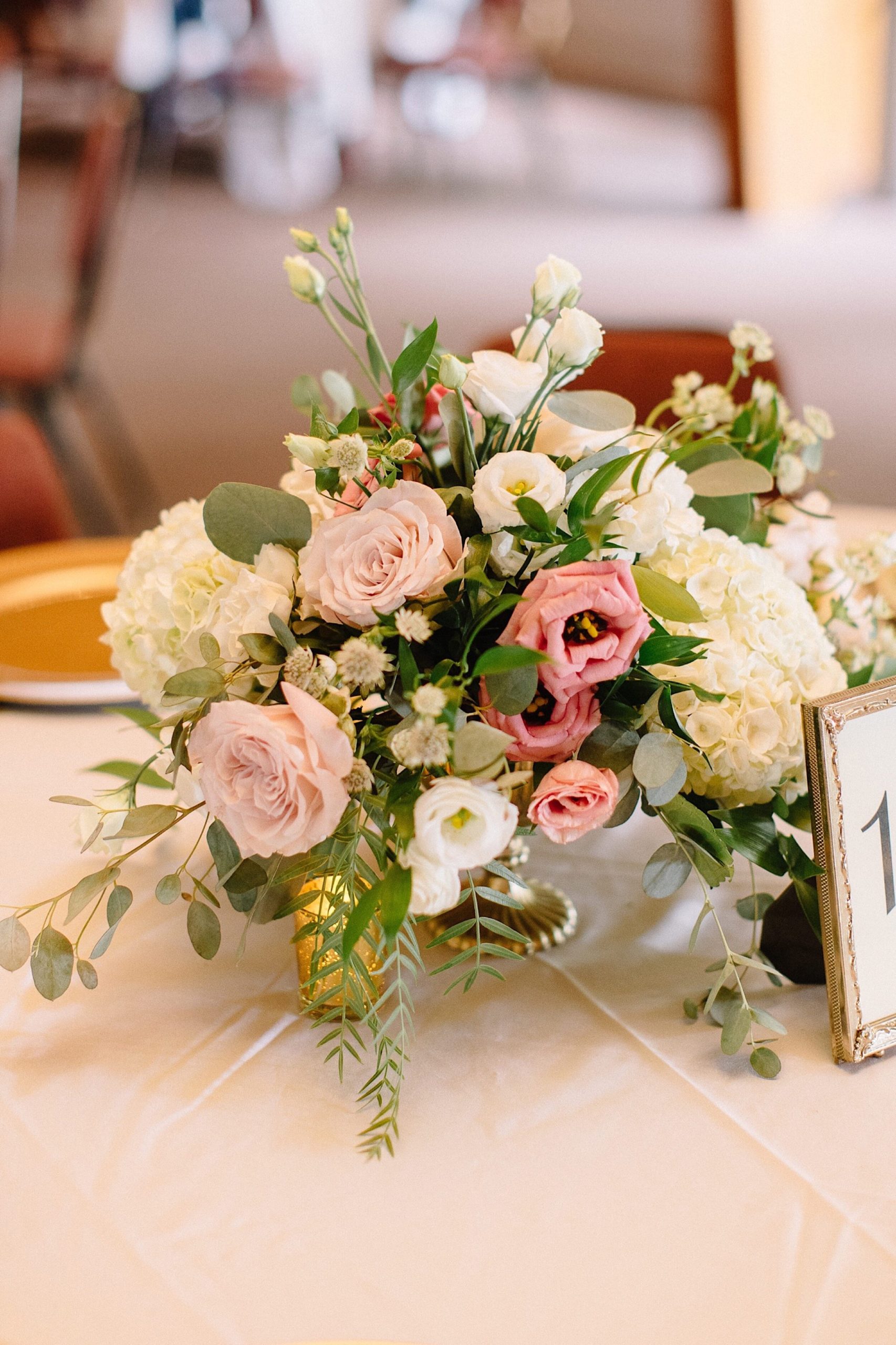 blush summer table flowers at Winona heritage room wedding reception